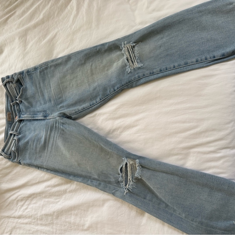 Distressed Light Blue Jeans